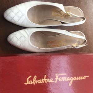 Ferragamo white leather sling back heels.